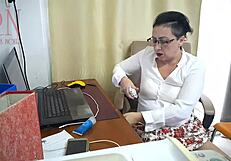 I watch my secretary get fucked with a dildo on the office security camera