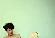 Skinny teen strokes monster cock horny on sunny bed