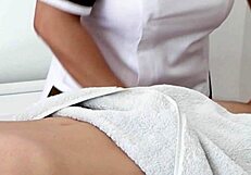 Close-up oiled massage handjob ends with huge cumshot pov