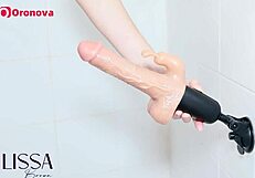 skinny babe spreads wet pussy close-up with toy on bed