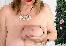 HORNY GRANNY MARIAOLD FLASHES HUGE TITS AND MASTURBATES TO SHAKING ORGASM!