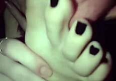 Polish lesbian self-worships feet coated in black nail polish