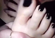 Polish lesbian self-worships feet coated in black nail polish