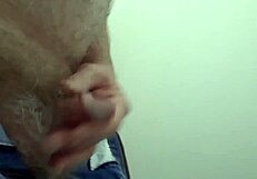 rustyas1 strokes small cock desperately in public toilet stall