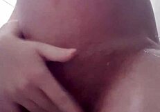 Pregnant blonde takes golden shower while bathing with friend