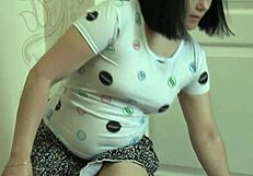 russian brunette squirts hairy pussy juices fingering bent over in miniskirt