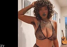 hey check this ebony babe teasing her big tits in sexy lingerie