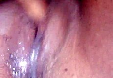 Girl fingers pussy until squirting mess