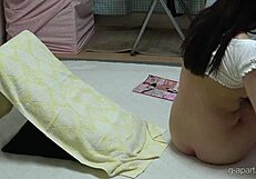 busty japanese student in tight shorts and socks fingers her pussy after porn mag tease!!