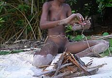 Skinny Naked African Girl Cooks Medicine for Granny in Forest