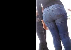 candid mexican teen struts in tight jeans showing off her huge latina ass