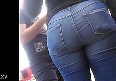 candid mexican teen struts in tight jeans showing off her huge latina ass