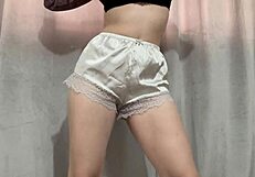 she fingers herself hard in tight white shorts and gloves teasing panties up