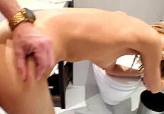 Petite blonde model bends over Hollywood bathroom sink for monster cock doggystyle facial