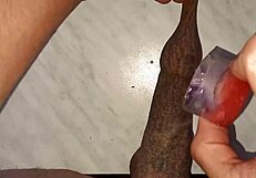 i drip hot wax on my long tattooed foreskin watching my penis swell huge and hard