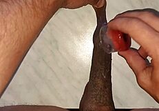 i drip hot wax on my long tattooed foreskin watching my penis swell huge and hard