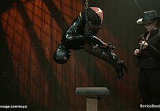 check out this bound slave choking in leather boots during rough torment