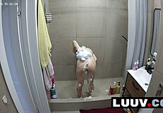 Luuv Beauty Grossy Lathers Up in the Shower, Flashing Her Perky Tits for Voyeur Eyes.