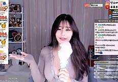 Korean cutie dances sexy with big tits bouncing for the guys